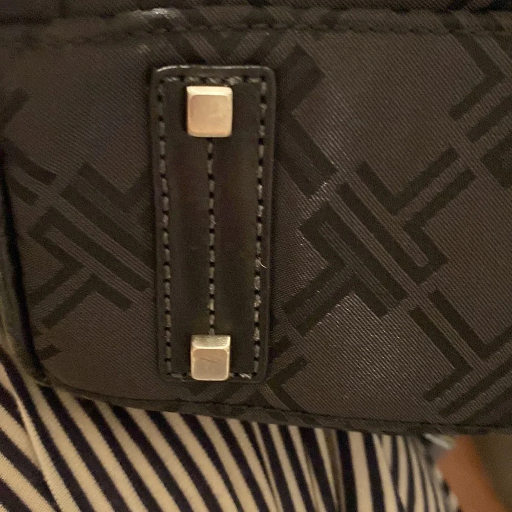 Tumi preowned definately
